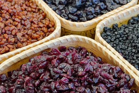 Dried forest berries in a baskets Stock Photos