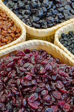 Dried forest berries in a baskets Stock Photos