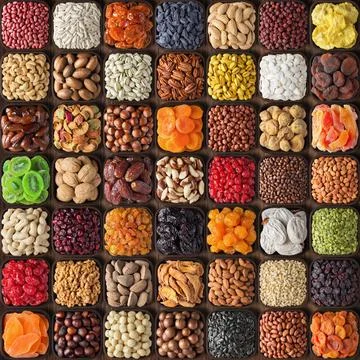 Dried fruit and nuts background. assorted organic food ingredients on wooden  Stock Photos