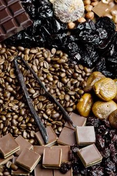 Dried fruit with chocolate and coffee beans Stock Photos