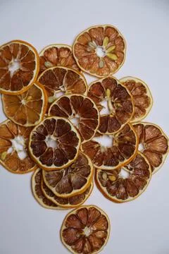 Dried fruit on colored background. Pattern of a fruit frips. Healthy eating Stockfoto's