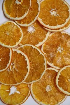 Dried fruit on colored background. Pattern of a fruit frips. Healthy eating Stock Photos