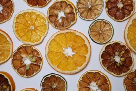 Dried fruit on colored background. Pattern of a fruit frips. Healthy eating Stock Photos