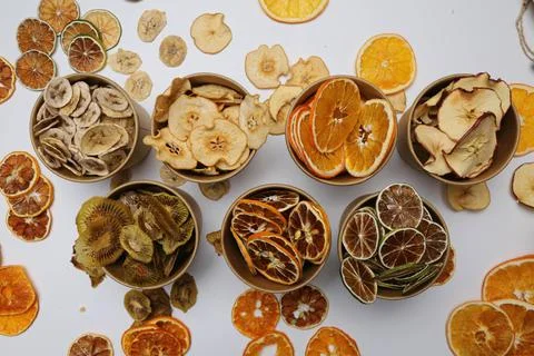 Dried fruit on colored background. Pattern of a fruit frips. Healthy eating Stockfoto's