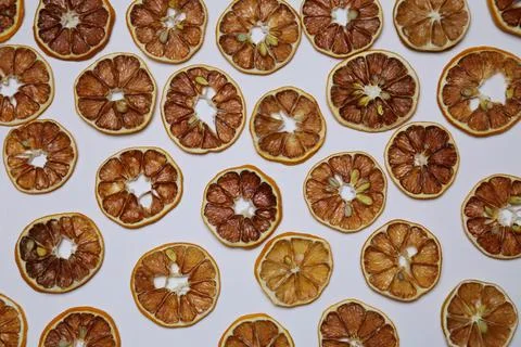 Dried fruit on colored background. Pattern of a fruit frips. Healthy eating Stockfoto's