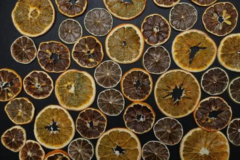 Dried fruit on colored background. Pattern of a fruit frips. Healthy eating Stockfoto's