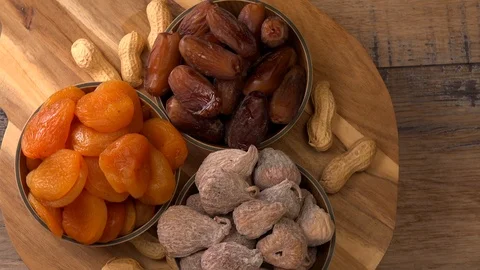 Dried fruit composition on turntable Stock Footage 127369236