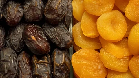 Dried fruit dates and dried apricots as background Stock Footage 108507114