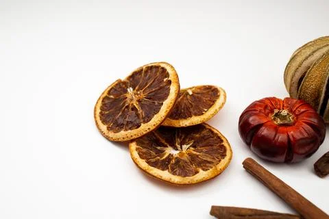 Dried fruit, fruit and cinnamon on white background Stock Photos