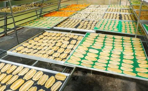 Dried fruit / Making dry fruit on net with banana pineapple papaya dried and  Stock Photos