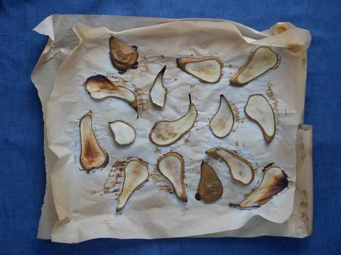 Dried fruit pattern - dried pear on parchment. 写真素材