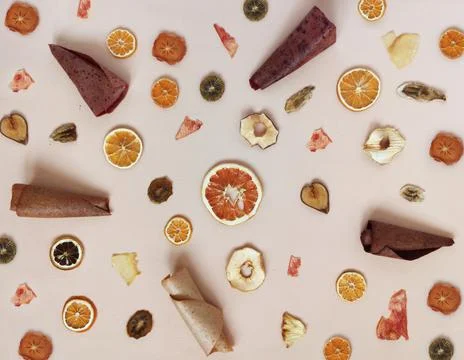 Dried fruit pattern. Healthy sweets fruit chips and fruit pastille . Stock Photos