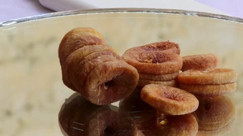 Dried fruit pieces turning for camera Stock Footage 338160555