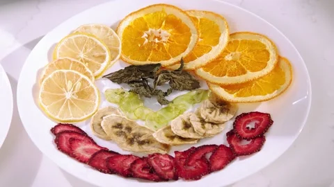 Dried fruit on the plate Video stock 148990845
