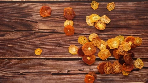 Dried fruit on a wooden table as key ingredient for fruit salad recipe Stock Footage 270095534
