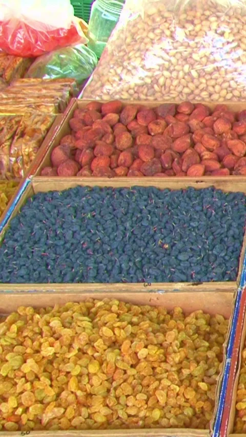 Dried fruits background. Yellow delicious sweet raisins close up 스톡 동영상 249246772