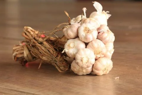 Dried garlic on the table. Stock Photos