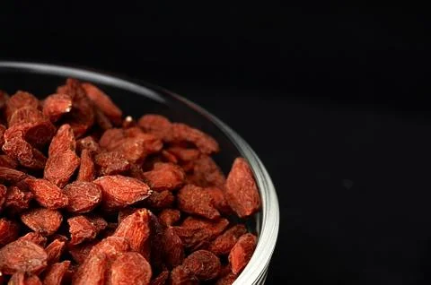 Dried goji berries on the table Stock Photos