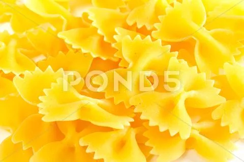 Dried italian pasta on white background Stock Photos