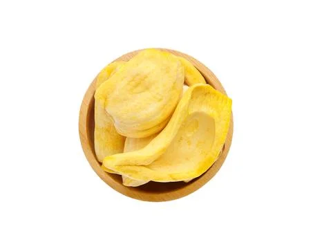 Dried jackfruit chips, dried jackfruit fruit in wooden bowl Stock Photos