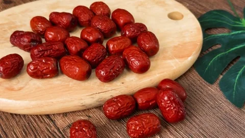 Dried jujube fruit, often called red dates or chinese dates, offering a healthy Stock Footage 331572832