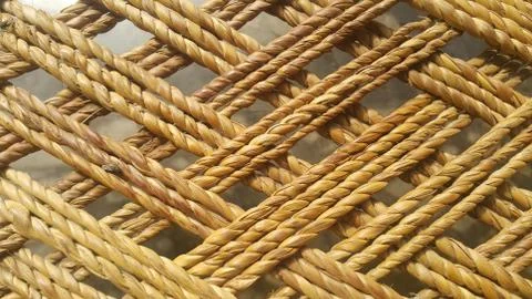 Dried jute thread or ropes interwoven for making traditional bed called charp Foto stock