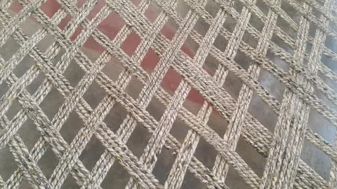 Dried jute thread or ropes interwoven for making traditional bed called charp Stock Photos