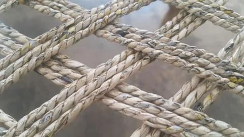 Dried jute thread or ropes interwoven for making traditional bed called charp Stock Photos