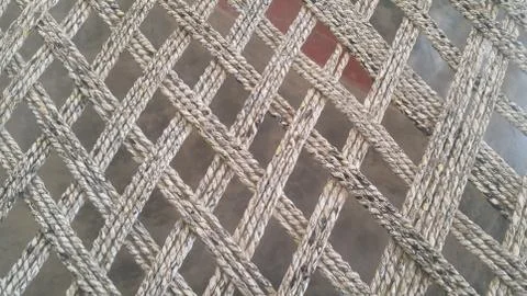Dried jute thread or ropes interwoven for making traditional bed called charp Foto stock