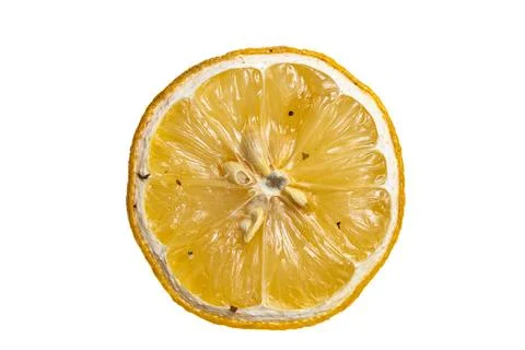 Dried lemon slice, close-up view showing texture and detail.  Perfect for c.. Stock Photos