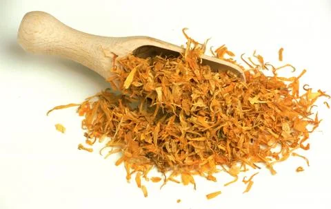 Dried marigold Calendula officinalis In naturopathy the dried flower heads are Stock Photos