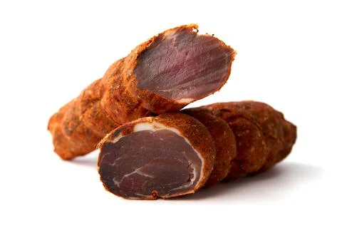 Dried meat beef jerky dry isolated on white background. Stock Photos