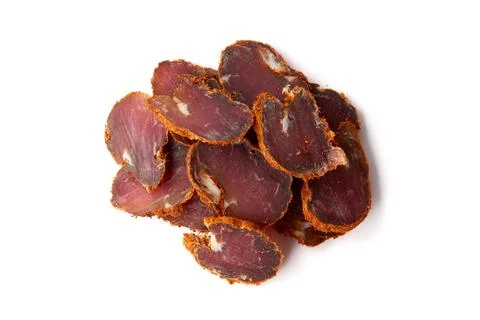 Dried meat beef jerky dry isolated on white background. Stock Photos