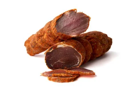 Dried meat beef jerky dry isolated on white background. Stock Photos