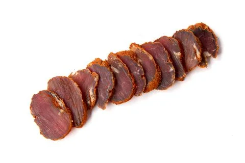 Dried meat beef jerky dry isolated on white background. Stock Photos