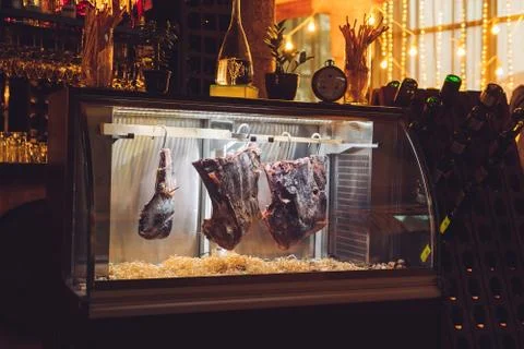 Dried meat. Beef steak in the drying oven. Stock Photos