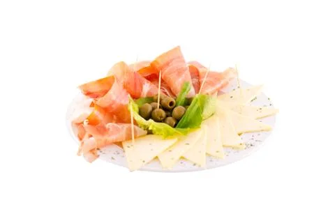 Dried meat (prshut), white cheese and green olives Stock Photos
