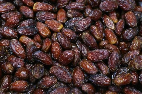 Dried medjool dates full-frame close-up flat lay Stock Photos