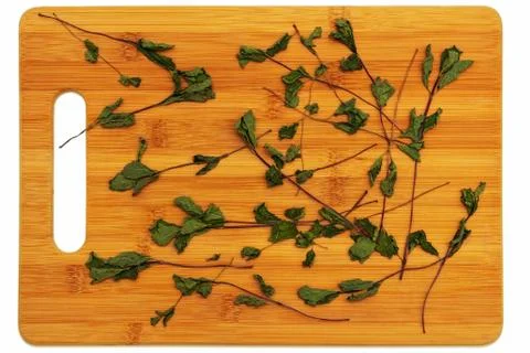 Dried mint on the board. Stock Photos