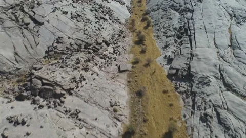 A dried up mountain stream in the mountains of Oman. 動画素材 106772054
