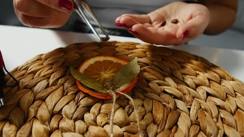 Dried orange, bay leaves and coffee beans. Christmas tree decoration. Stock Footage 151748853