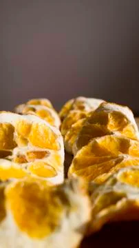 Dried orange on a dark background Stock Photos