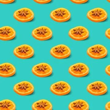 Dried orange or mandarin pattern with anise on a blue background Stock Photos