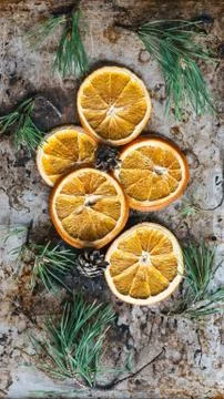 Dried oranges with pine cones and twigs Stock Photos