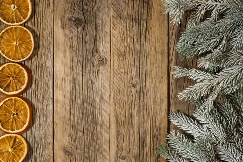 Dried oranges from the tree branches on an old wooden table. Stock Photos