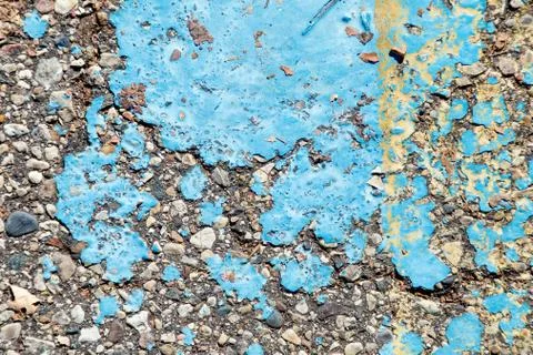 Dried paint on asphalt texture Stock Photos