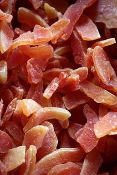 Dried papaya fruit with sugar pattern Stock Photos