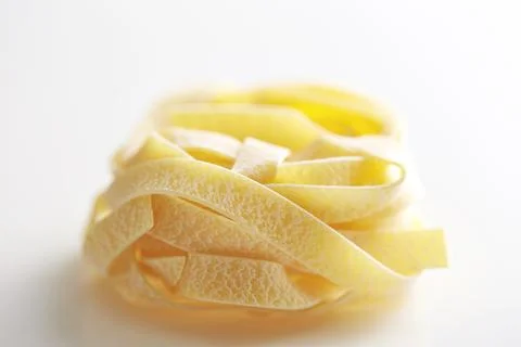 Dried pasta on a white background Stock Photos