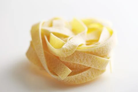 Dried pasta on a white background Stock Photos