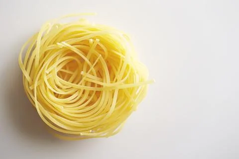 Dried pasta on a white background Stock Photos